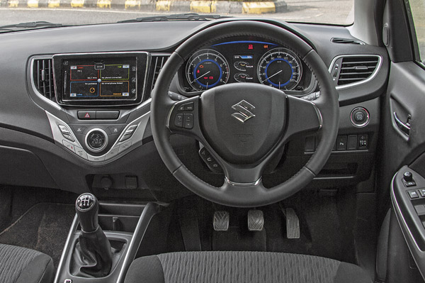 Baleno's dash design is fresh but still too many standard Suzuki bits.